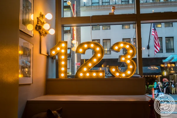 Sign at Cafe 123 in Times Square, NYC