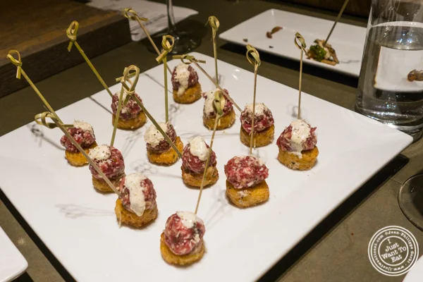 Risotto tater tots with beef tartare at Todd English Food Hall at the Plaza Hotel, NYC, New York