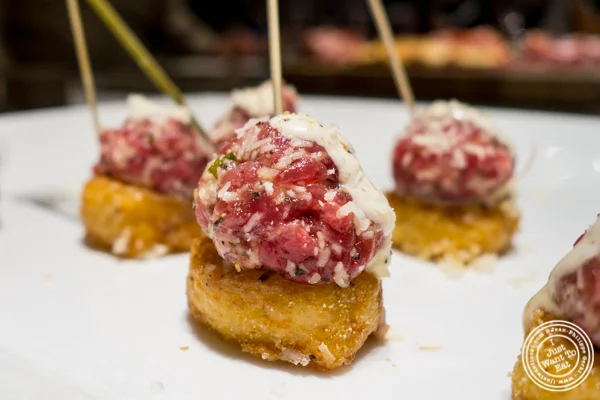 Risotto tater tots with beef tartare at Todd English Food Hall at the Plaza Hotel, NYC, New York