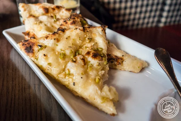 Olive and garlic naan at Kurry Qulture in Astoria, Queens