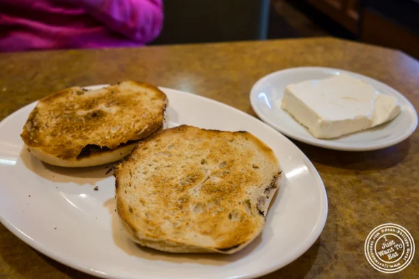 Bagel and cream cheese at Stage Door Deli in Hell's Kitchen