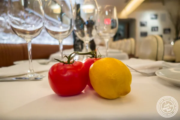 Tomatoes and lemon on table at Mamo NYC in Soho