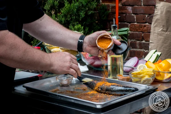 Executive Chef Kevan Vetter preparing fish at The Grilling University with McCormick