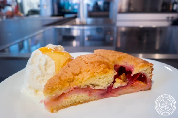 Plum tart with ice cream and truffle honey at Urbani Truffle Lab in NYC, NY