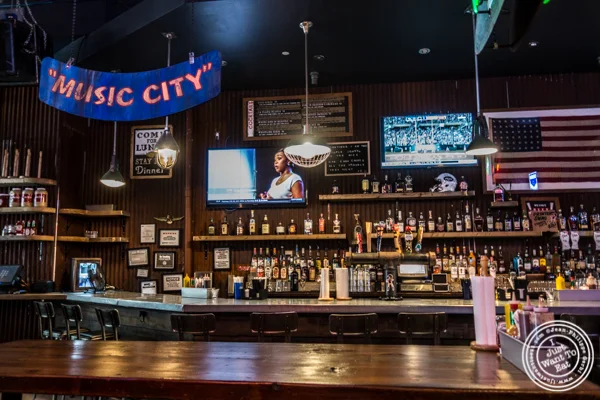 Bar area at Printers Alley in NYC, NY