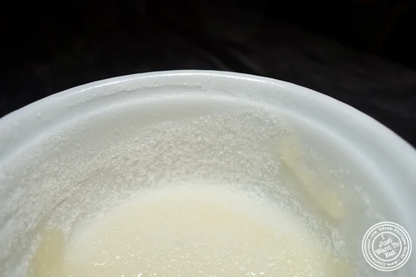 Coat the sides of the ramequins with butter and sugar