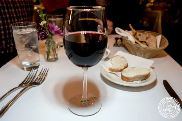 Glass of Pinot Nero 2015 at Bar area at Basta Pasta in Chelsea, NYC