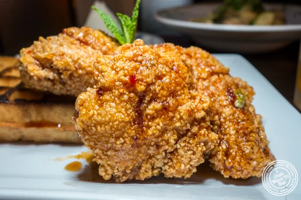 General Tso Chicken and waffle at Qi Bangkok Eatery in Hell's Kitchen