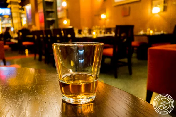 Glass of Balvenie single barrel 15 yr whisky at Butcher and Banker steakhouse in NYC, NY