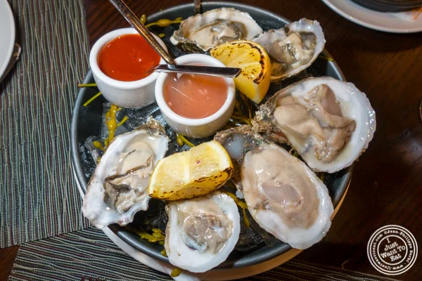 East coast and West coast oysters at Butcher and Banker steakhouse in NYC, NY