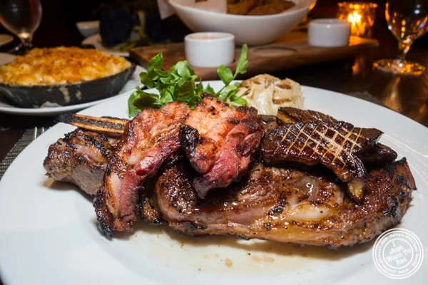 Cowboy bone-in ribeye at Butcher and Banker steakhouse in NYC, NY