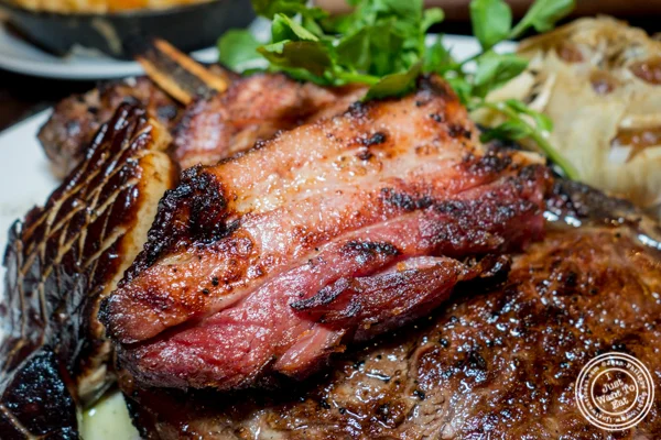 Thick cut of bacon at Butcher and Banker steakhouse in NYC, NY