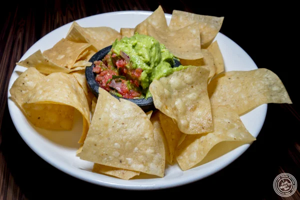 Guacamole and chips at Sexy Tacos Dirty Cash in Harlem