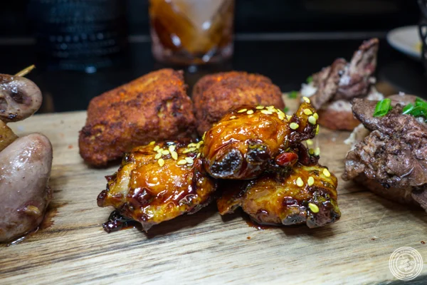 Glazed wings at Le Coq Rico in NYC, NY