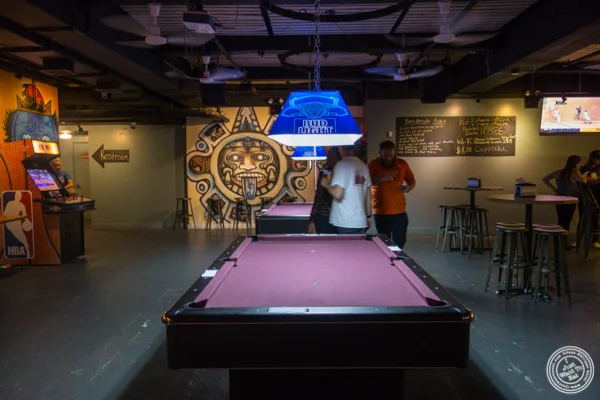 Pool table at American Hall Beer and Arcade in NYC, NY