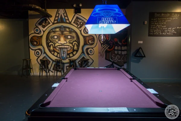 Pool table at American Hall Beer and Arcade in NYC, NY