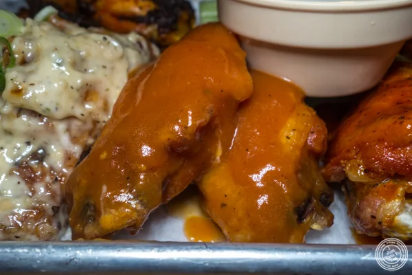 Mango habanero wings at American Hall Beer and Arcade in NYC, NY