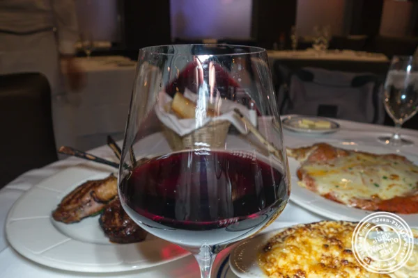 Glass of Chianti at Tuscany Steakhouse in NYC, NY