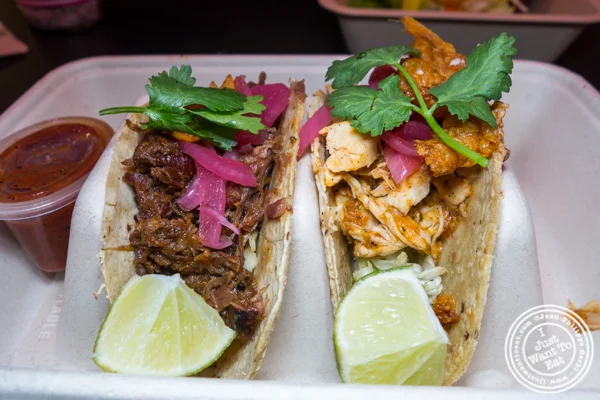 Beef short ribs and rotisserie chicken Tinga tacos at Taco Dumbo in NYC, NY