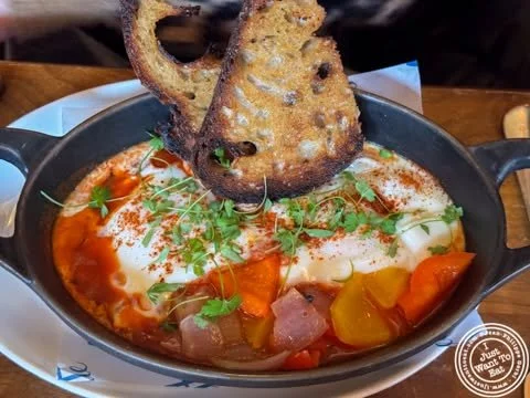 Savoring the flavors of the Mediterranean at @lafayette380 with their  Shakshuka dish! 🍴👌 The aroma of the spices and the freshness of the ingredients are a perfect combination. If you're a foodie like me, you have to try this spot out! 🤤. . . . .