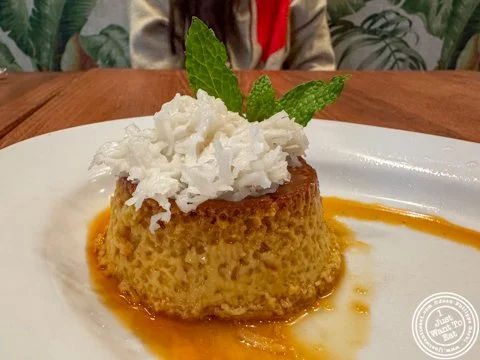 The **flan de coco** at **@rumbacubana** in Jersey City was pure tropical comfort in dessert form 😍🥥🍮 

This one hits you first with that deep coconut aroma, then the texture takes over &mdash; silky, custardy, and so smooth it practically melts t