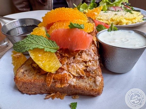 Brunch at Gair in Brooklyn came with a fun twist: their corn flakes French toast 🤩🥞
Crusted in corn flakes ($20) and served with maple syrup, orange‑infused labneh, plus slices of orange and grapefruit for a bright finish 🍊✨

@gairebk
#ijustwantto