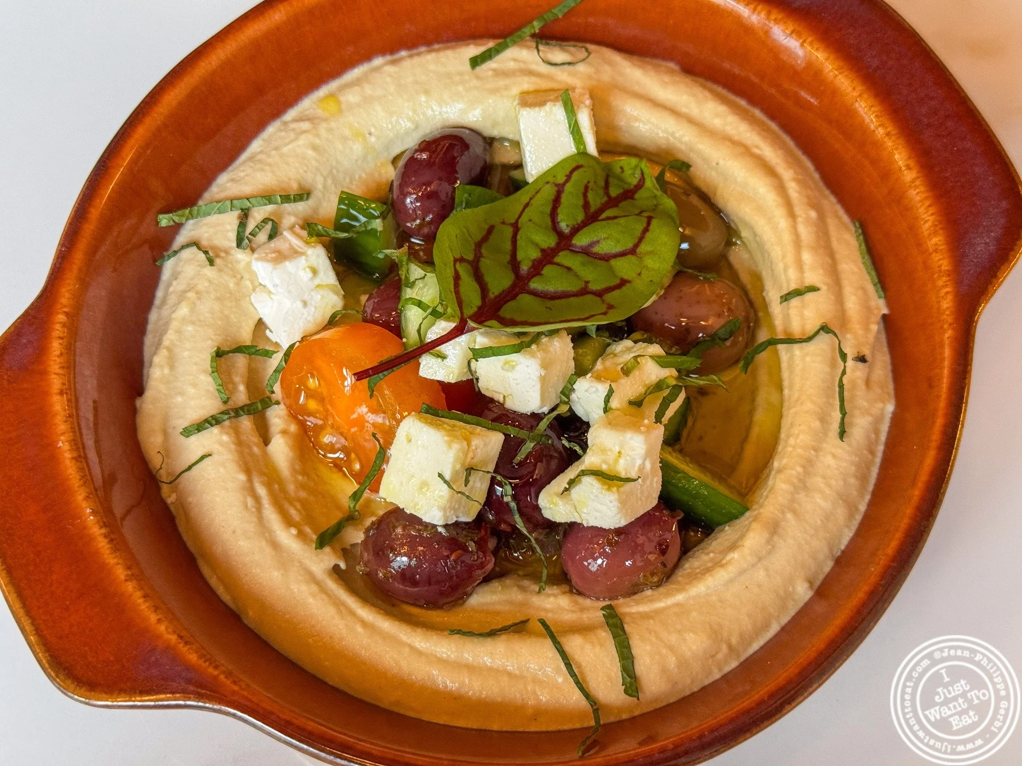 🫒🥙 Sometimes, the best way to start a meal is with great hummus, and @mediterraneancuisinejc delivered! 😍

We began our meal with their homemade hummus, topped with feta and olives 🧀🫒. Smooth, creamy, and full of flavor, it was the perfect appet