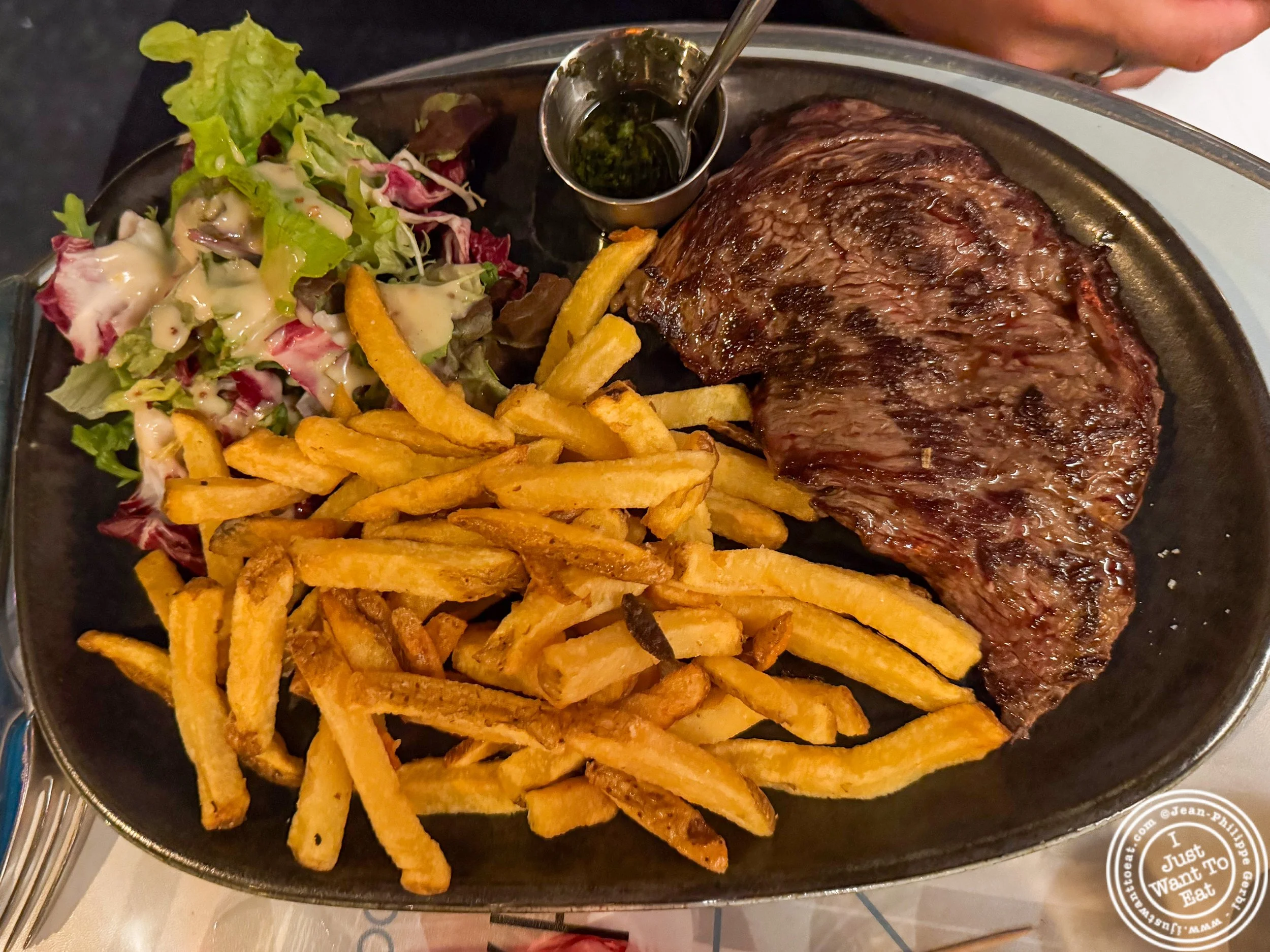 Bavette de boeuf with fries and salad at Le Hameau in Paris