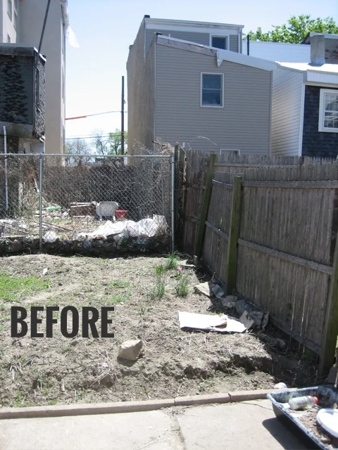 BEFORE - THE CONCRETE WALL HID THE EYESORE NEIGHBOR