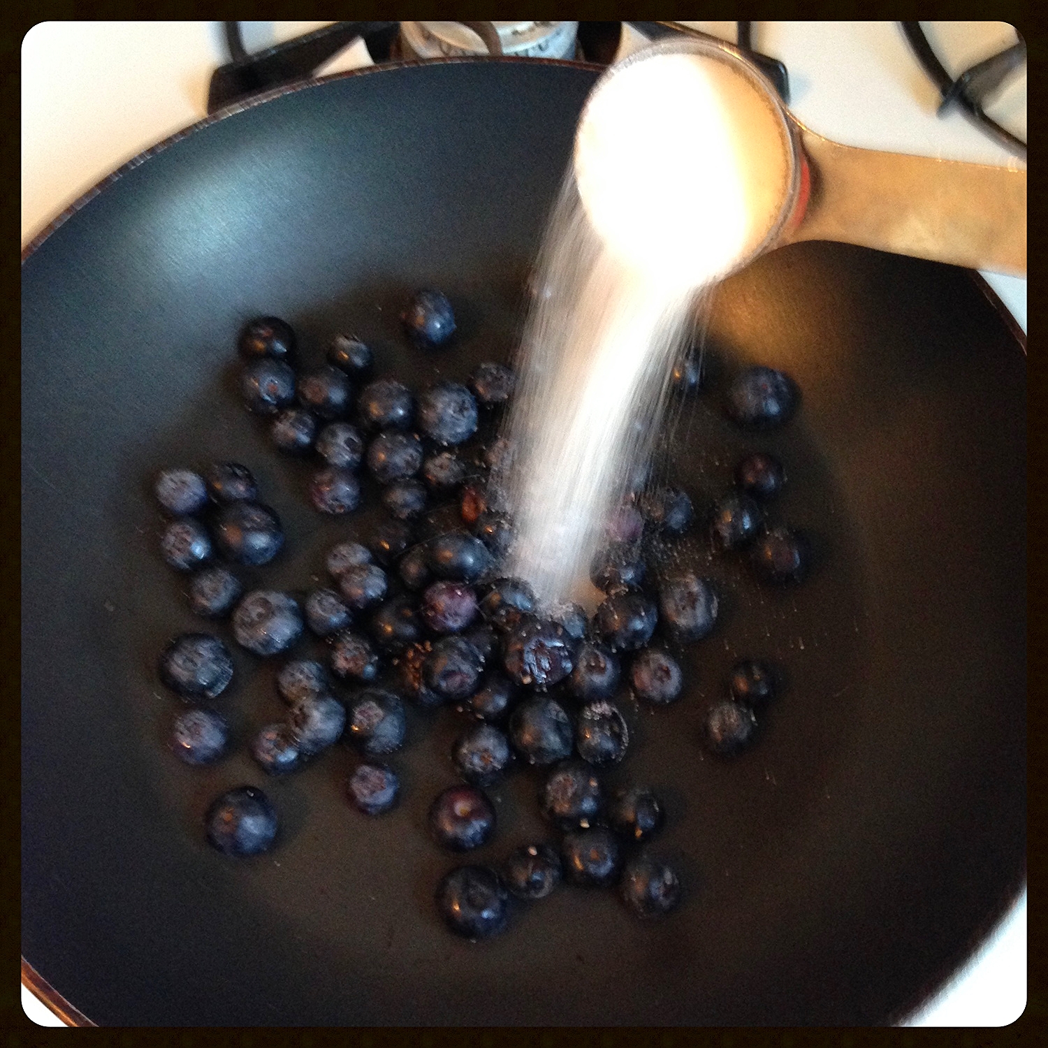 Adding Sugar to the Blueberries 