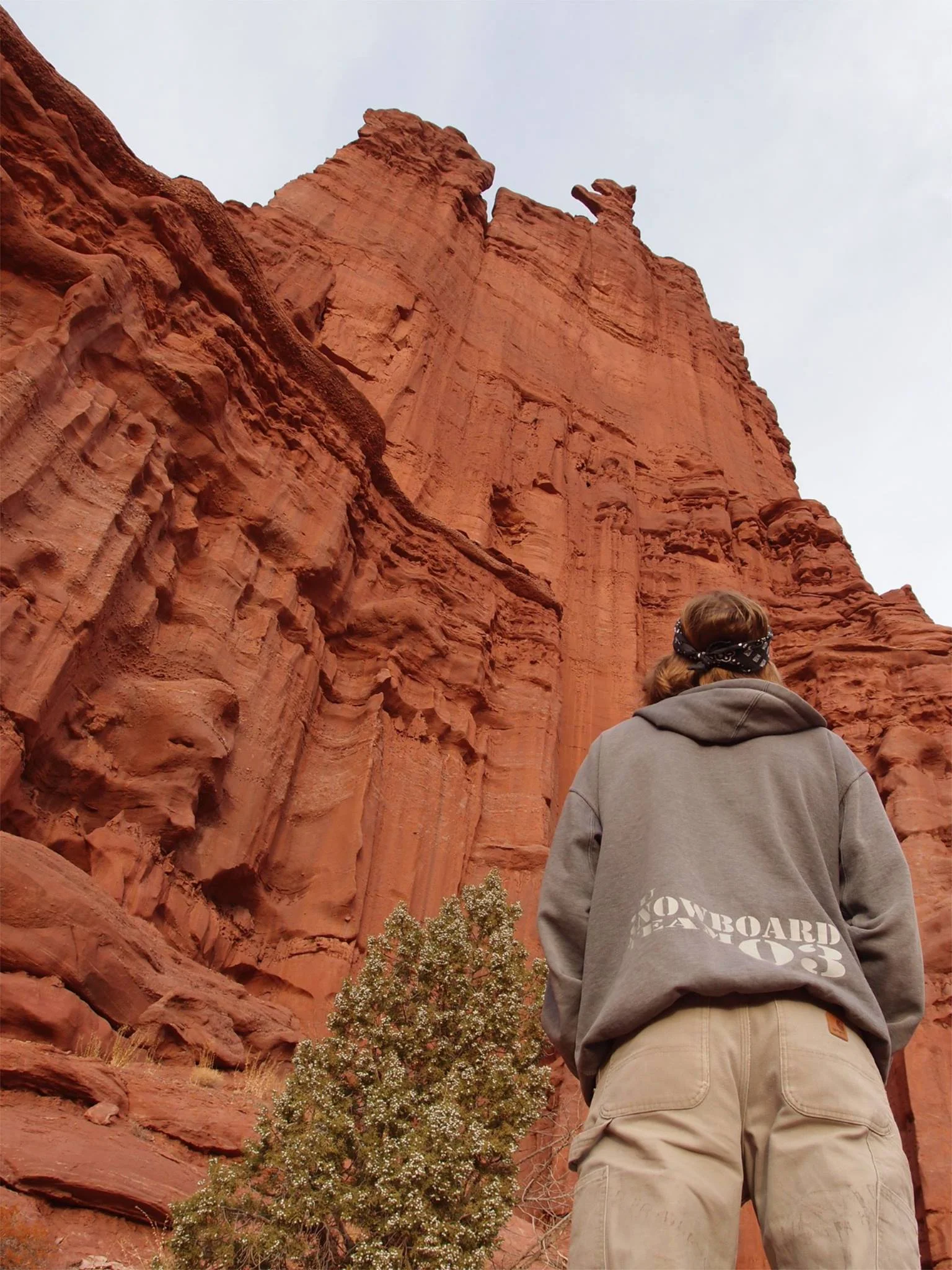 Gazing up at the corkscrew summit of Ancient Art in the Fisher Towers. Ancient Art is one of the smaller pinnacles in the Fishers, approximately a third of the height of the major summits. Photo by Mandi Prout