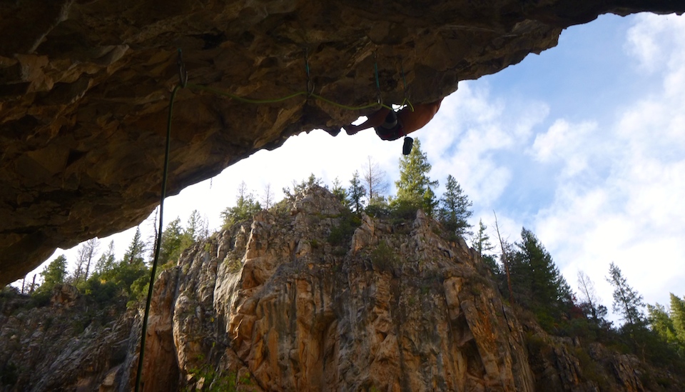 Elliott Bates climbs the steep rock of Simply Read at Rifle Mountain Park last fall.