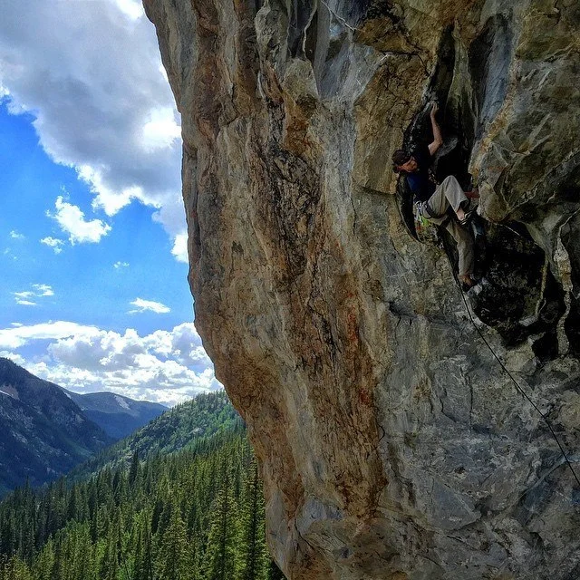 Climbing a 5.13a on Independence Pass near Aspen, Colo., in June. Photo by Chris Schulte.