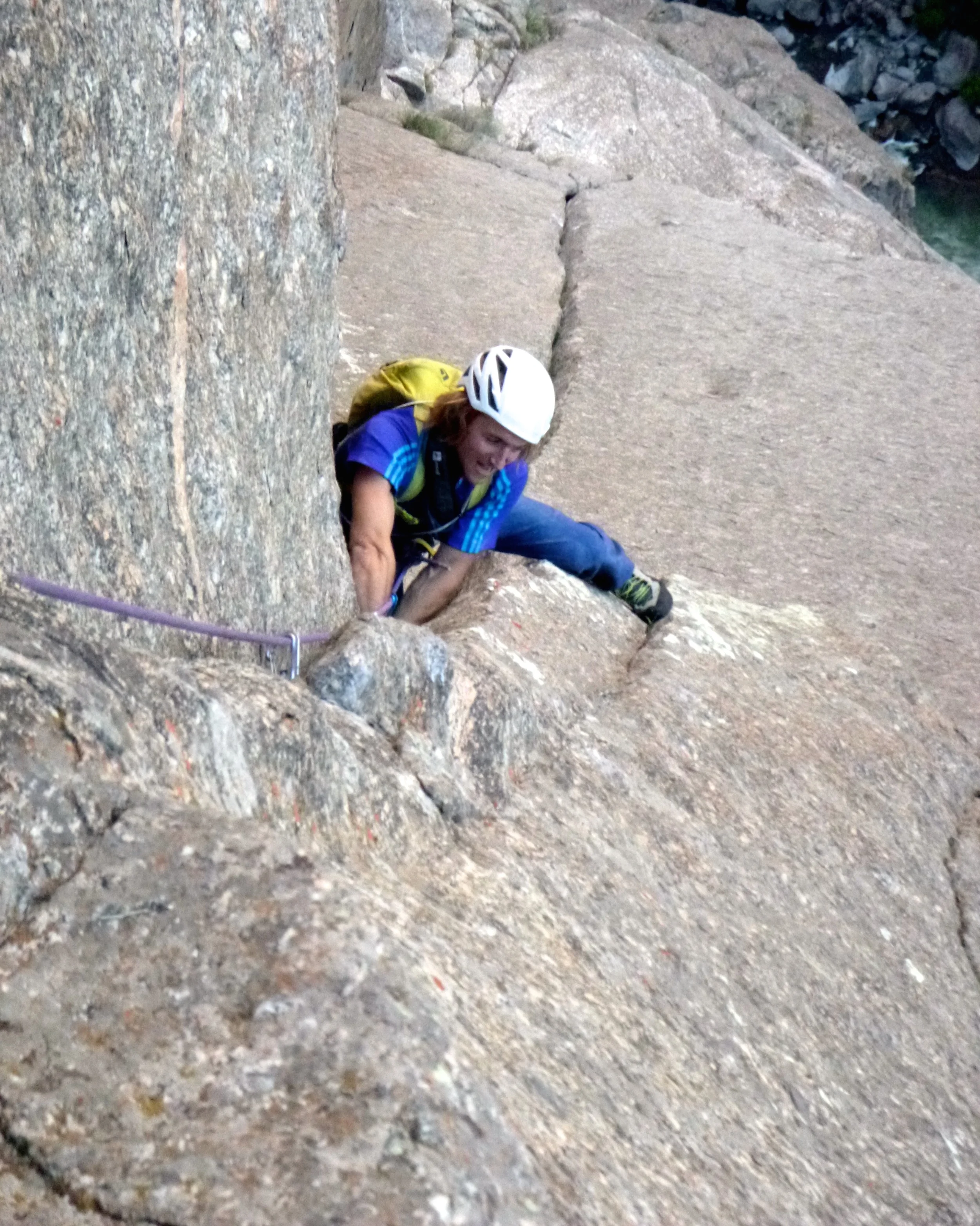 Jack follows pitch eight (5.11a), an awkward finger crack in the back of a flare.