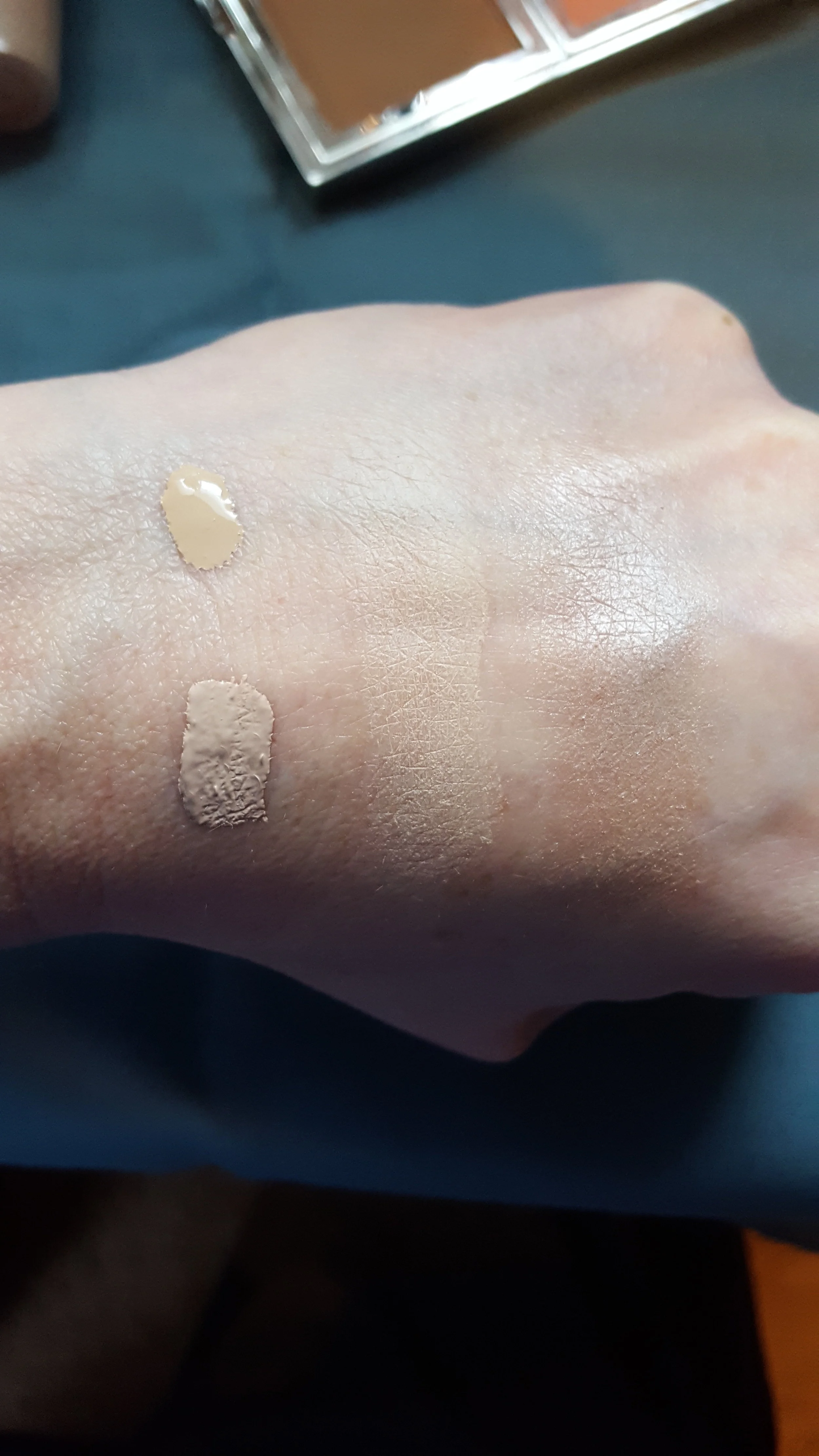 Left top-foundation; Left bottom-concealer; Middle-powder foundation; Right-highliter