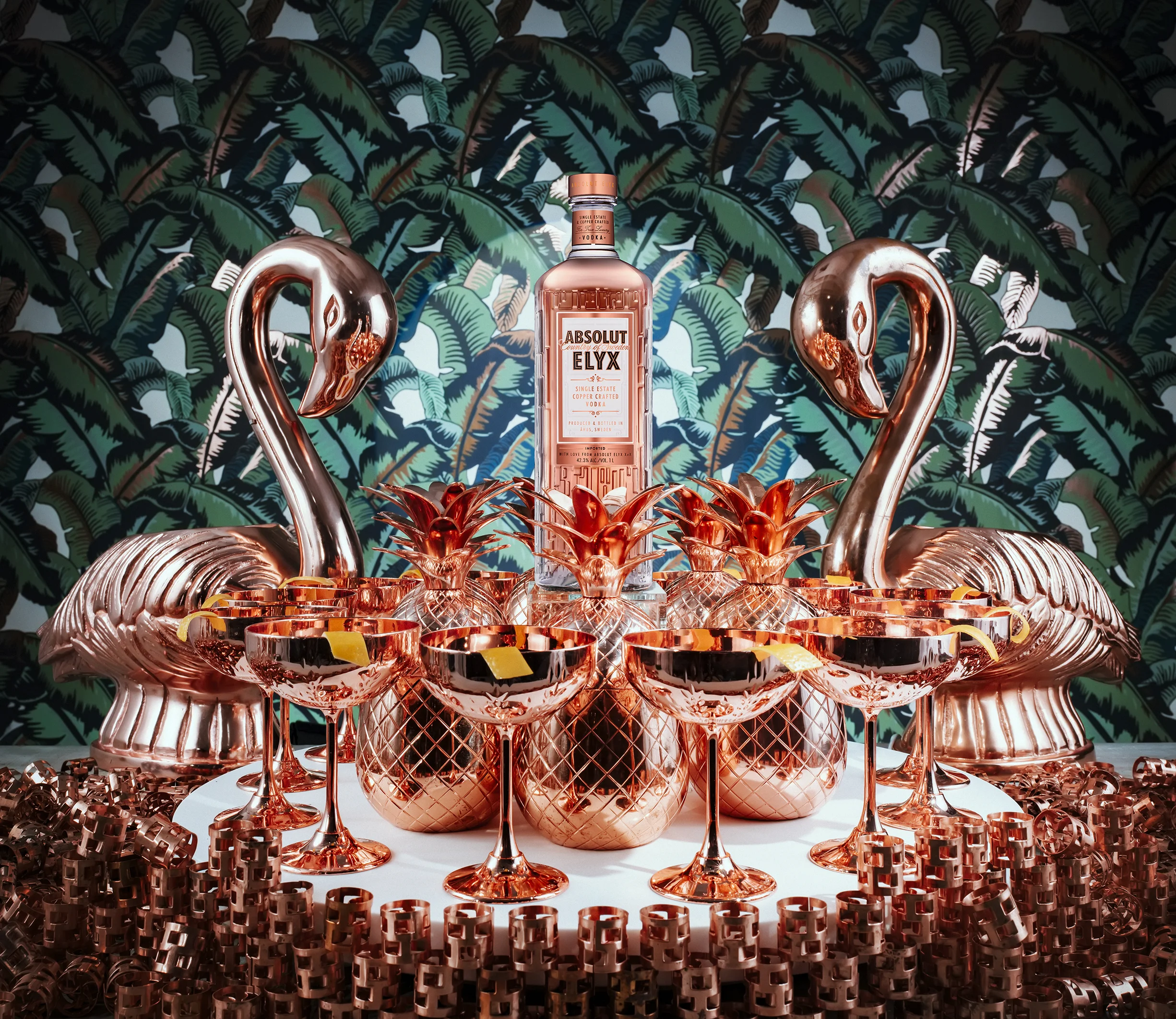 1Ltr Bottle in Ring of Copper Pineapples and Coupes.jpg