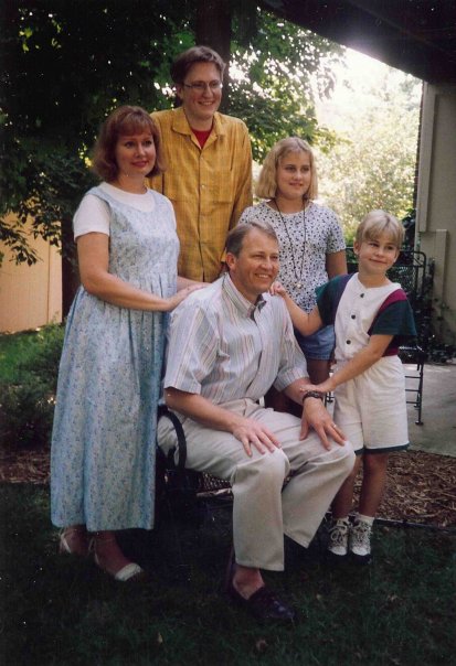 Me (pictured right) with my family c.1997