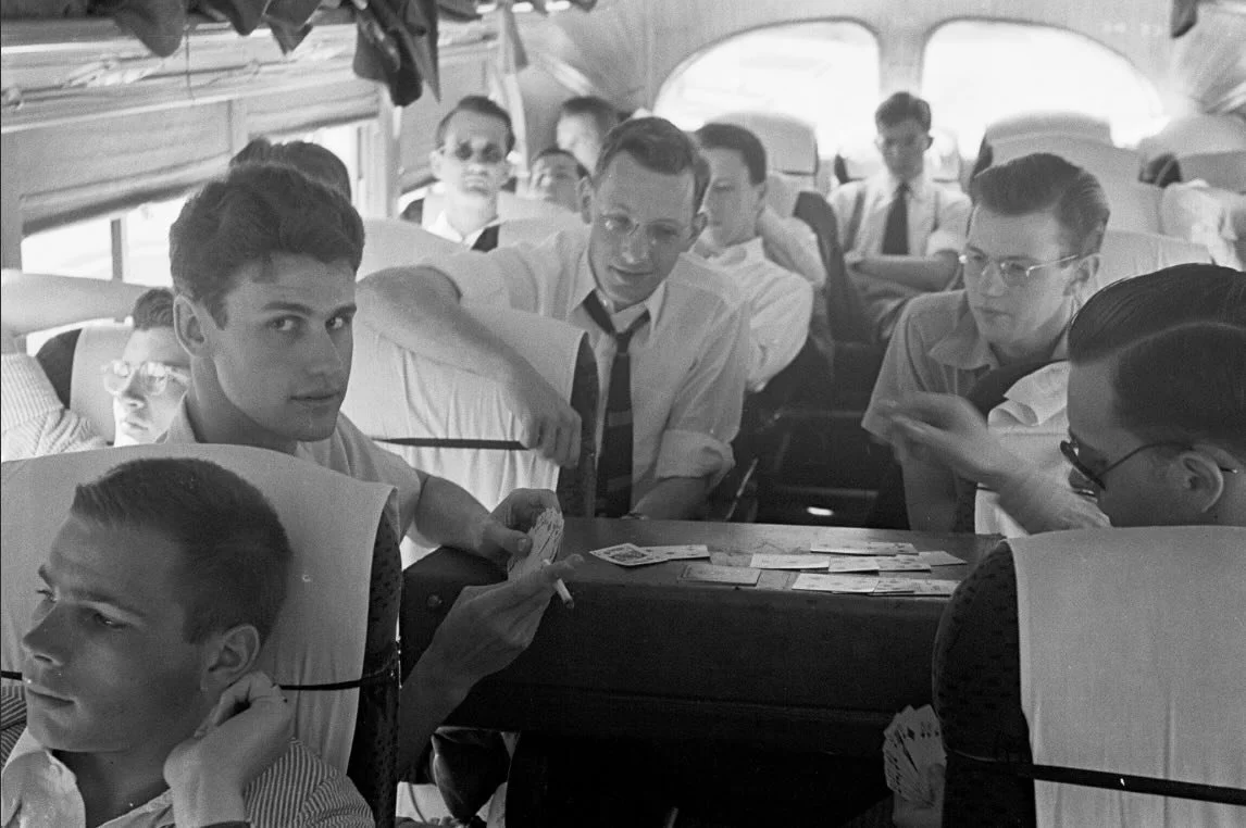 FOUR DAYS to the 85th.

📷 Spring, 1941 &mdash; on tour with the Glee Club, a group of Princeton students gathers in a crowded bus, turning a suitcase into a card table as the miles pass. Among them are members of the Glee Club Octet that would soon 
