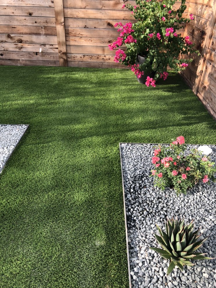 Turf install and steel planter beds.jpg