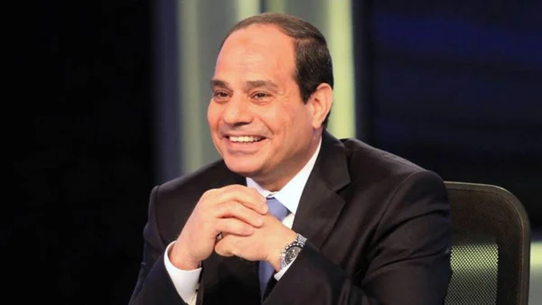  President Abdel Fattah el-Sisi is elated after having a shot at Lesean McCoy. 