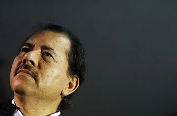  A confused President Ortega as he looks at his draft board, which was written with crayon. 