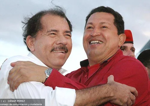  President Ortega hugs his roster adviser after defeating Russia in week 1. 
