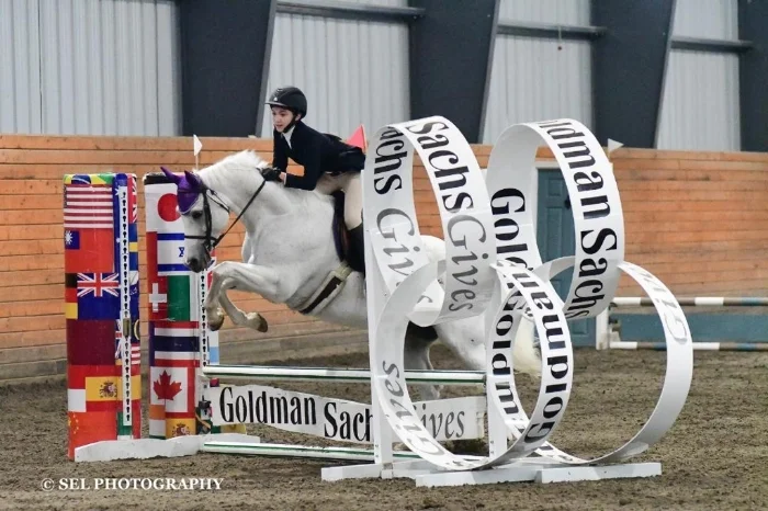 Cami and her pony George at Crosswinds jumper show