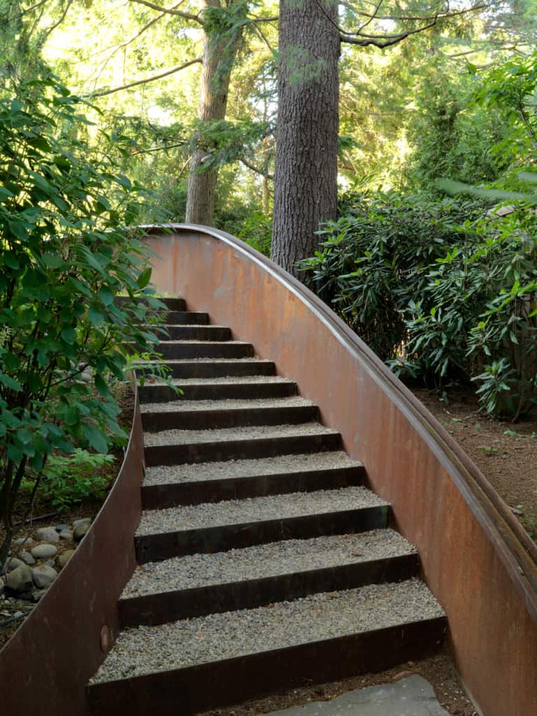 Peastone and steel steps.