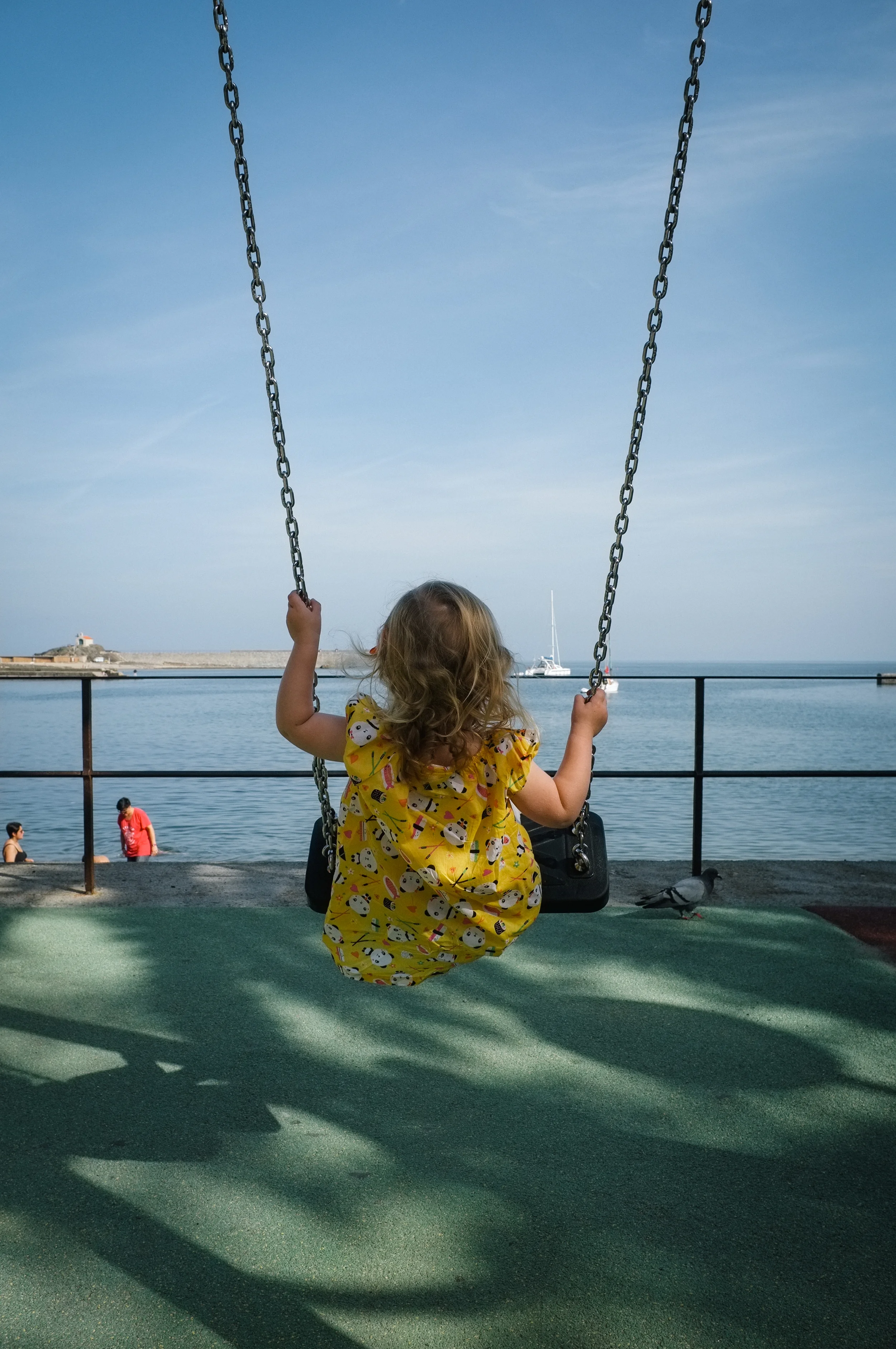 Riding the "big girl" swing for the first time. Collioure