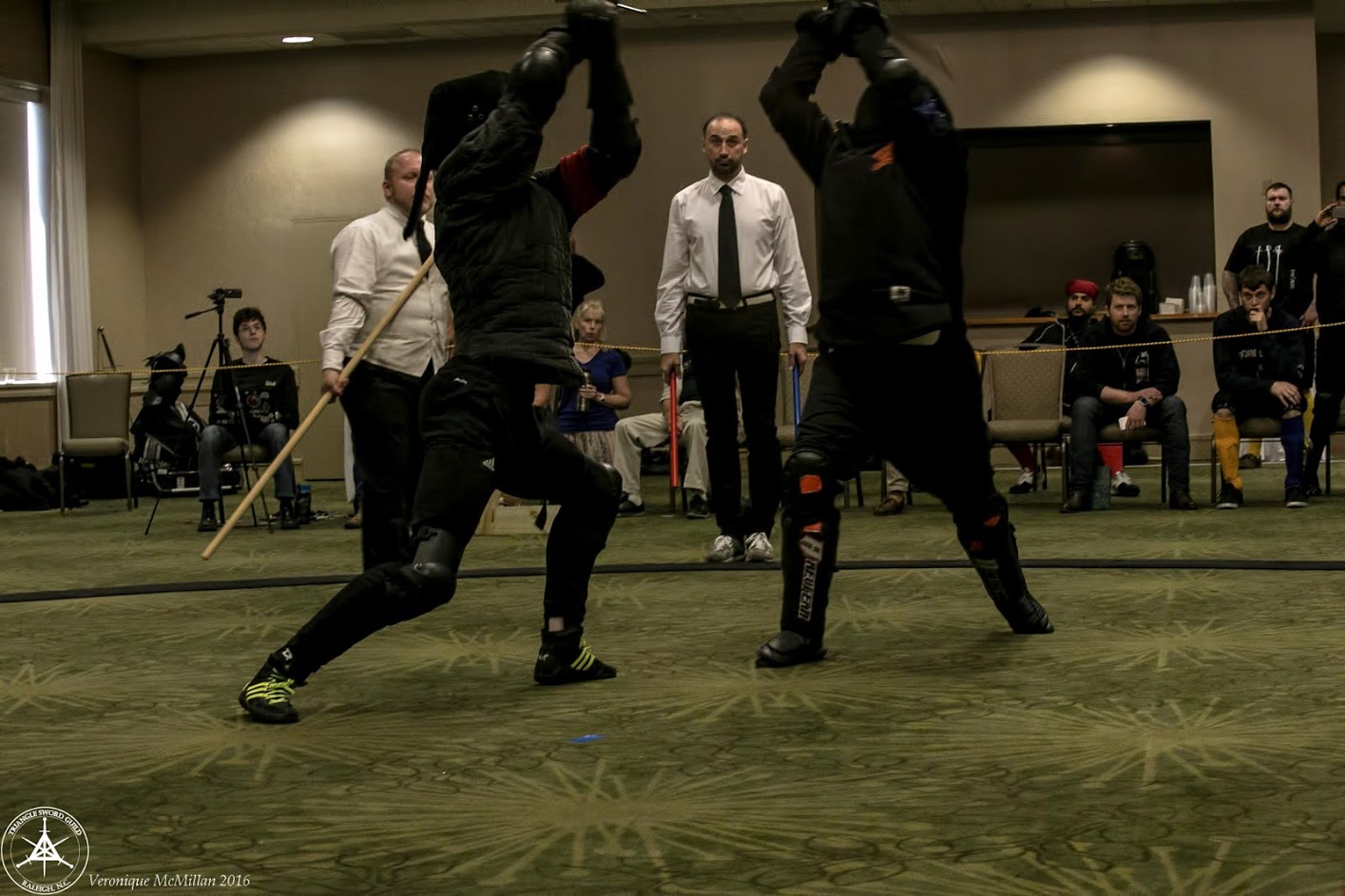 I'm the guy in the white vest that you sometimes see photobombing the fencers you're trying to take a picture of.
