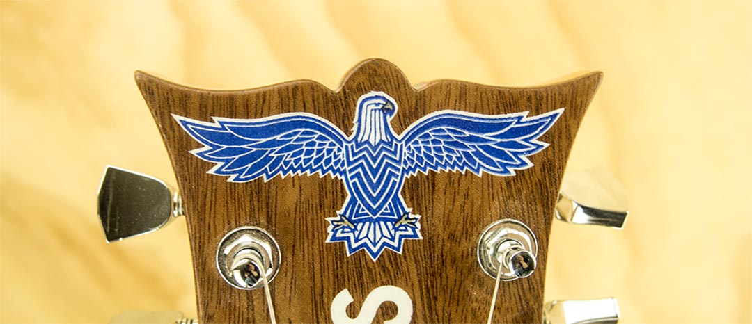 Headstock Graphic detail - Design and 3 spot color screen print by Jacob Swogger for MPLS Instrument Company.