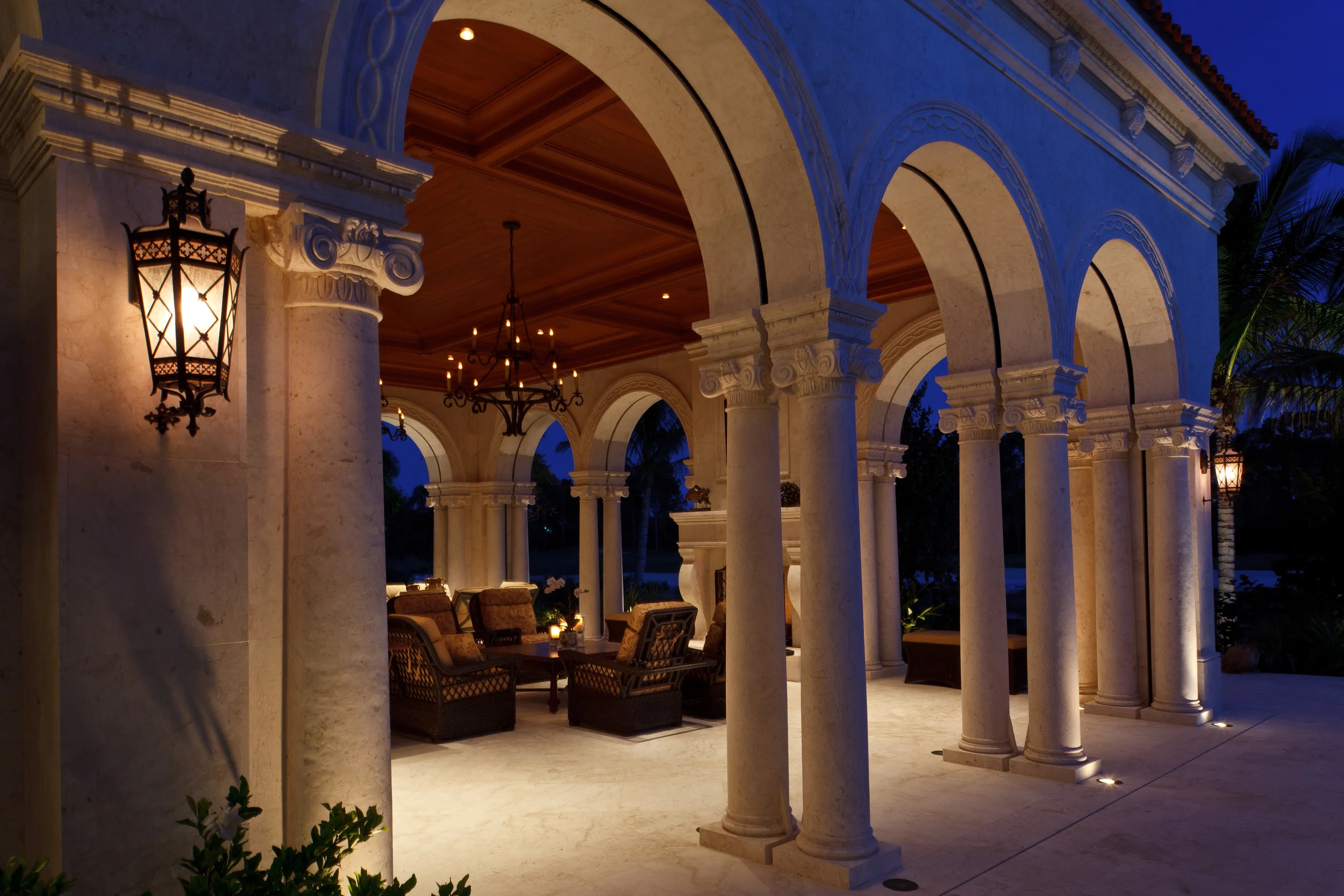 Interior and exterior details were coordinated to create a consistent and elegant Spanish Moorish character. The columns and ceiling of this welcoming lanai are typical of the exhaustive and inventive design detailing throughout the Florida home.