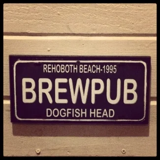 As the new Dogfish Head Brewing and Eats opens, we take a look back on the first 22 years of Dogfish and their downtown home.&nbsp;
