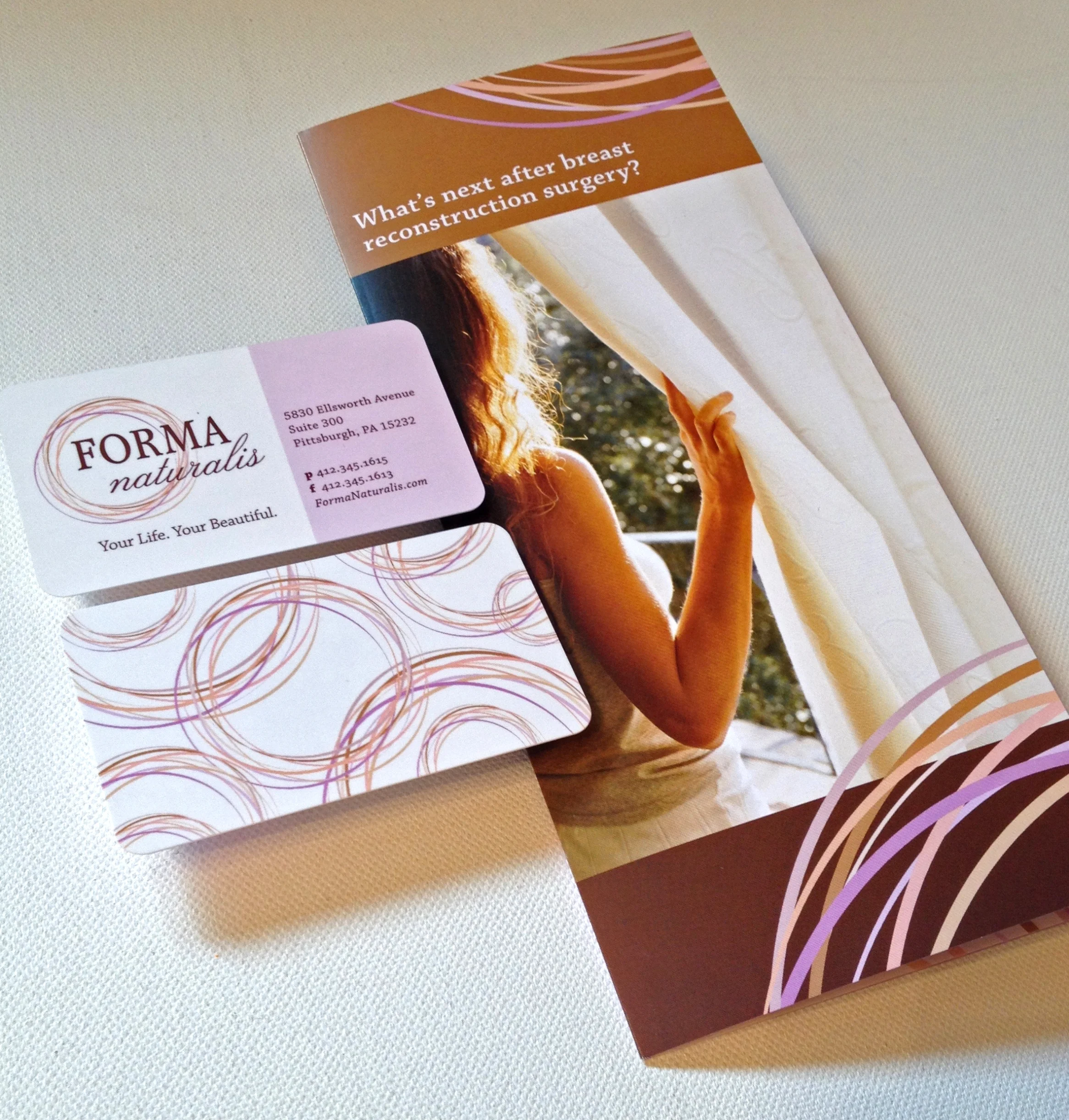 FORMA Naturalis logo, business card front and back, and tri-fold capabilities brochure.